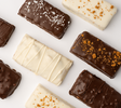 An assortment of Loada Balls protein bars on a white background. 