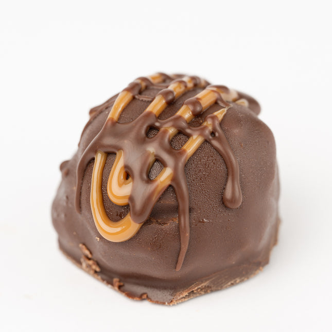 The Loada Balls caramel protein ball product image close up product render on a white background.