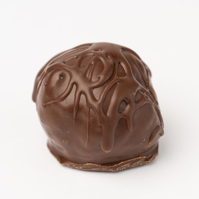 The Loada Balls Raspberry Coconut protein ball product render close up on a white background.
