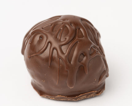 Loada Balls Raspberry Coconut protein ball close up product render on a white background.