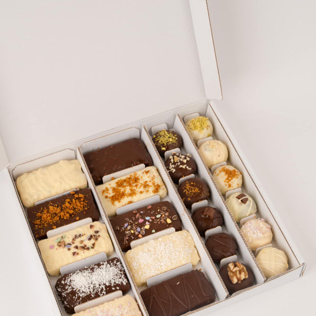The Loada Balls ultimate bundle of protein bars and balls in an assortment of flavours in a pizza box style package.