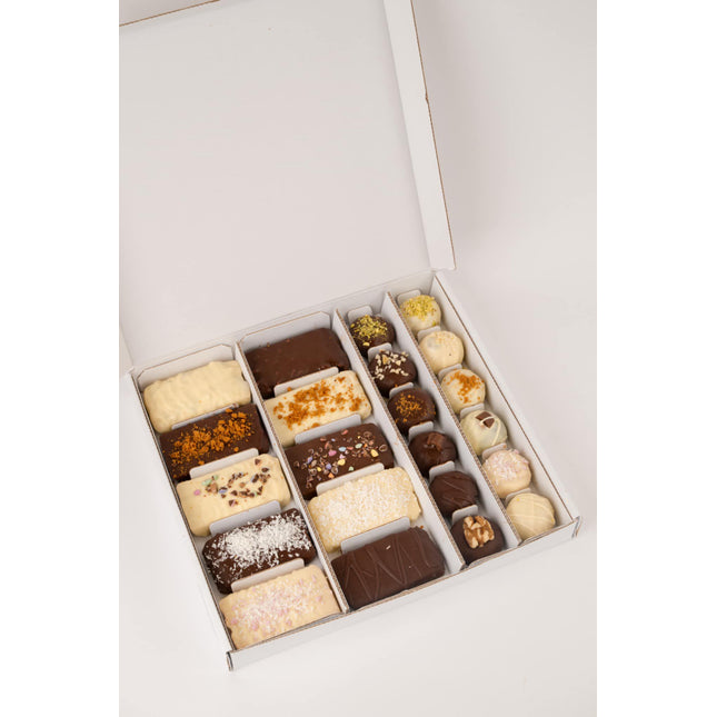 The Loada Balls ultimate bundle of protein bars and balls in an assortment of flavours in a pizza box style package.