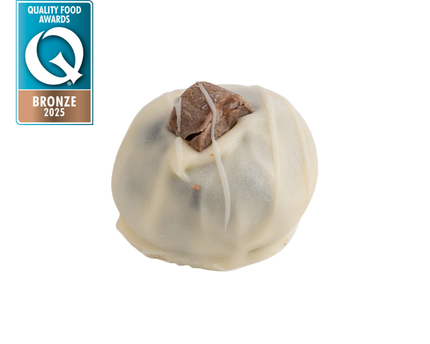 A close up product image of the Loada Balls White Caramel ball withe the bronze UK Quality Food Awards logo 2025