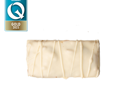 A shot of a single White Peanut Btter & Caramel Protein bar by Loada Balls with the UK Quality Food Awards Gold Logo 2025