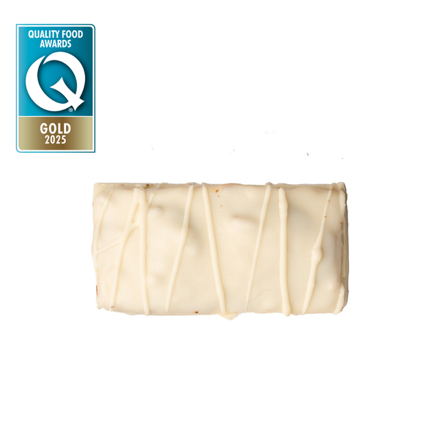 A shot of a single White Peanut Btter & Caramel Protein bar by Loada Balls with the UK Quality Food Awards Gold Logo 2025